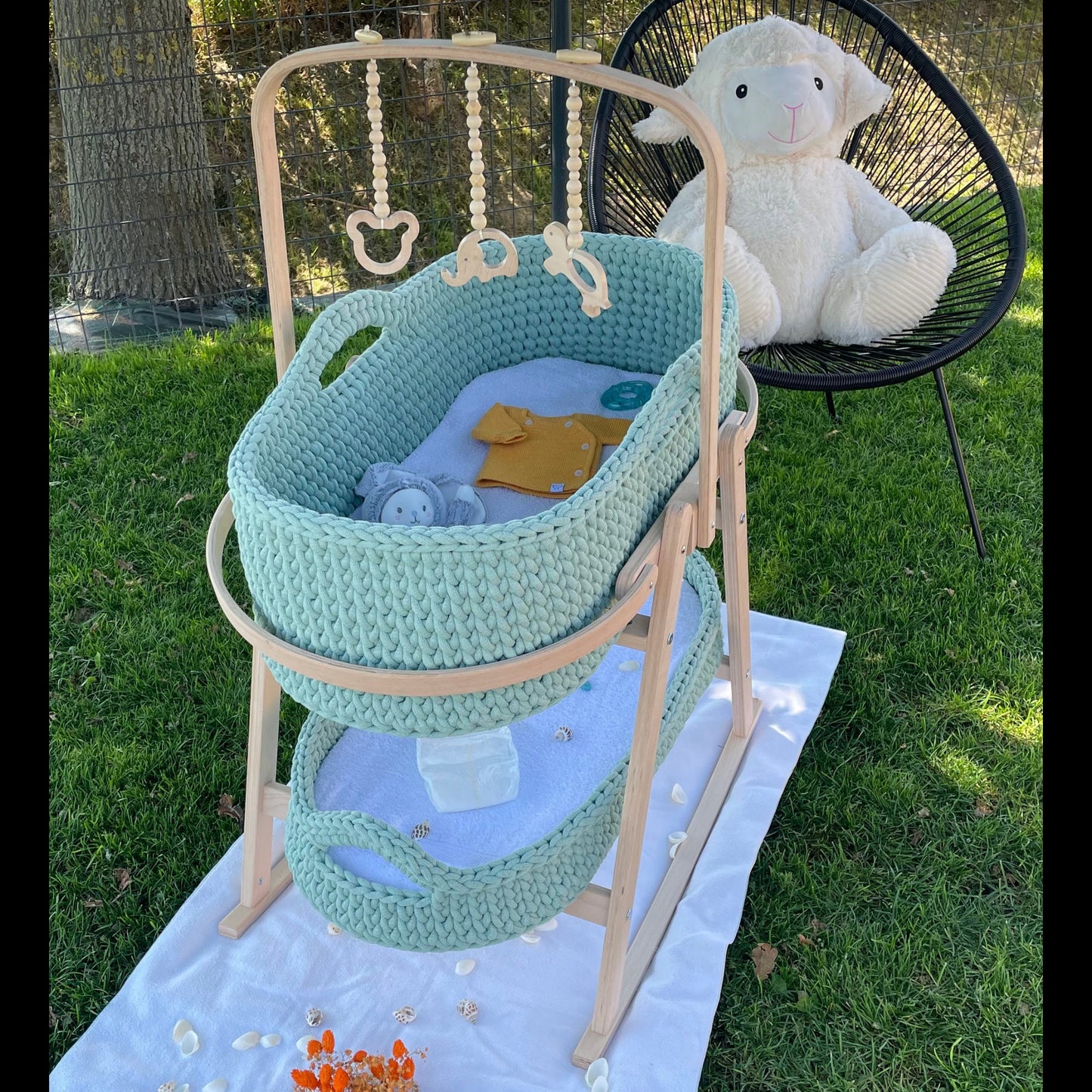 Support à bascule pour couffin bébé - L'Harmonie